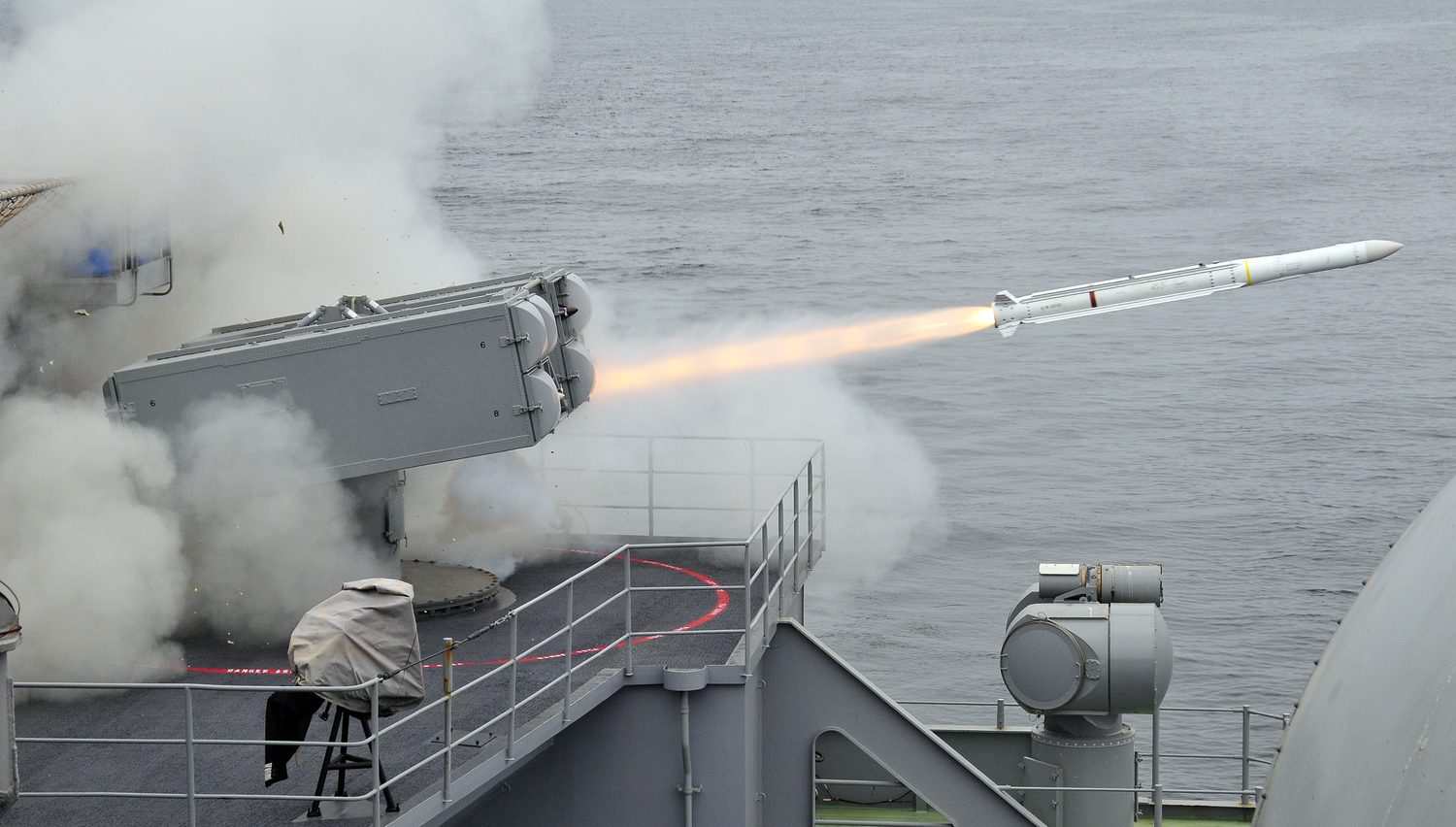 An Evolved Sea Sparrow missile launches from the deck of USS Carl Vinson.